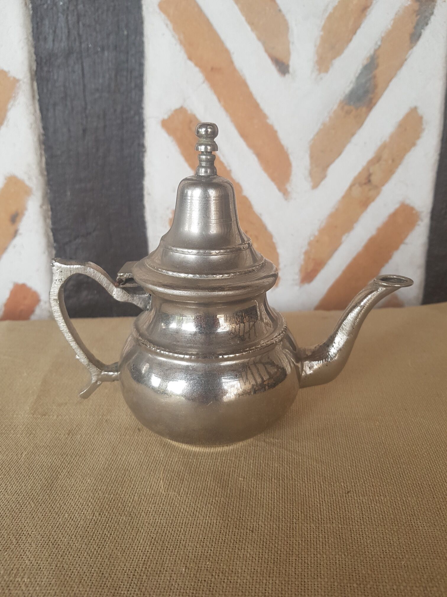 Oriental teapot silver metal