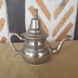 Oriental teapot silver metal