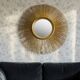 Large sunburst mirror with beveled glass and gilded wood from around 2010.