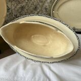 Sauceboat on a wrought iron base from Salins.