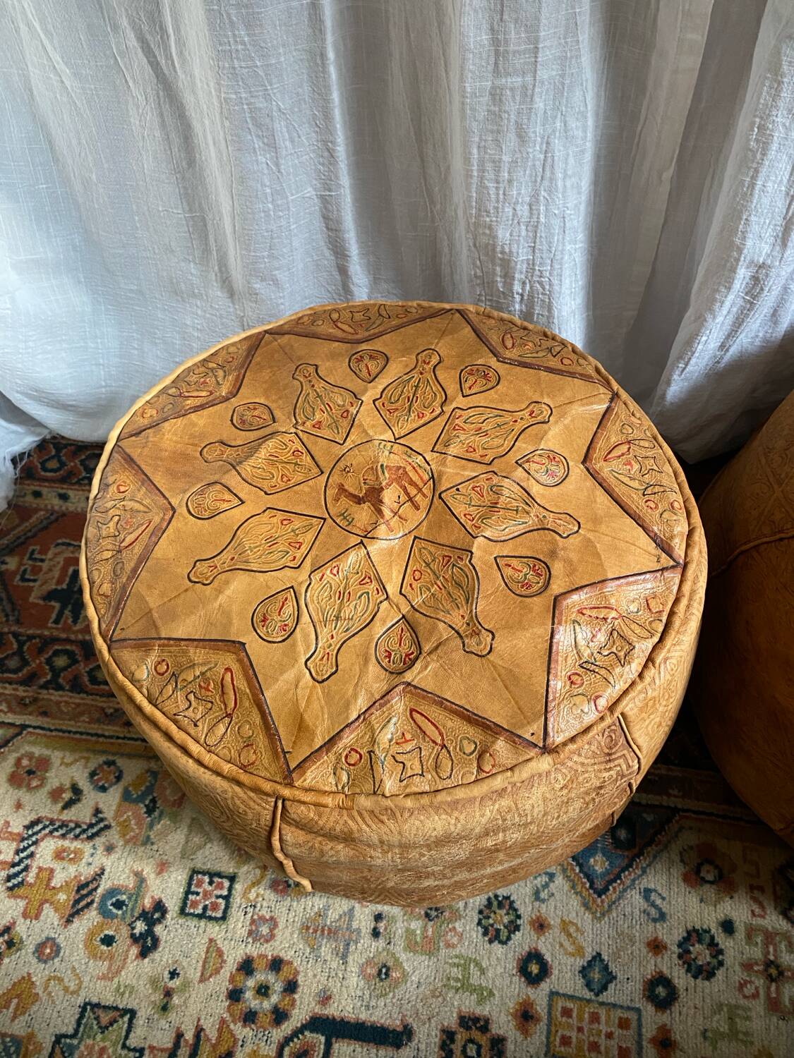 Pair of leather poufs