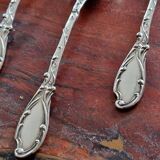 Ravinet d'Enfert: 12 small spoons in solid silver and vermeil, Rococo