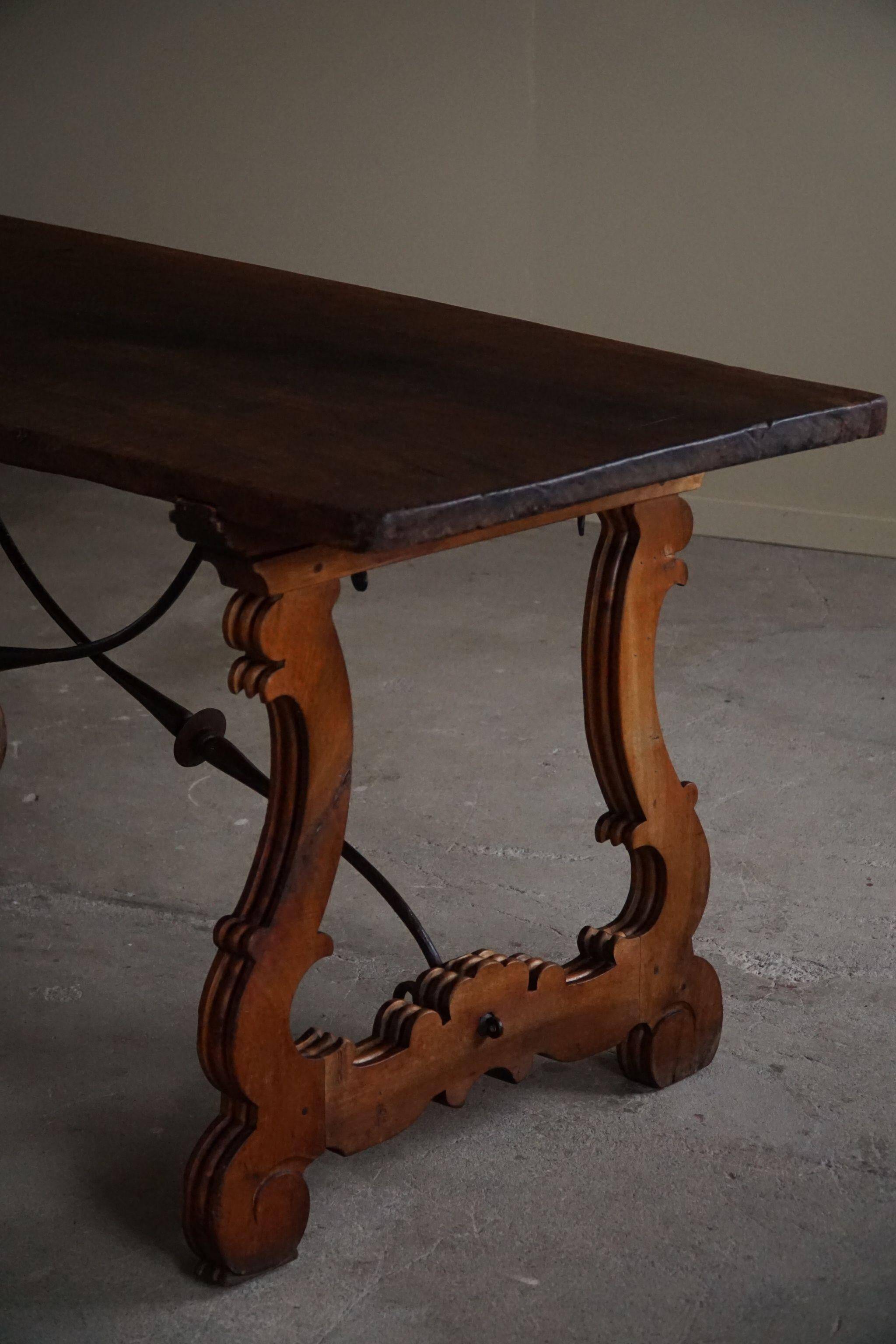 Brutalist table in antique Spanish solid oak and wrought iron, 19th century.