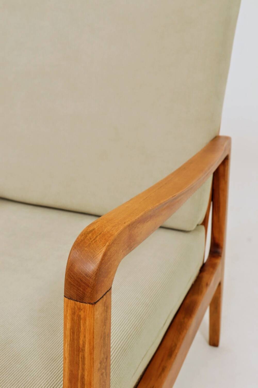 Vintage armchair in khaki corduroy, mid-century modern design from the 1960s.