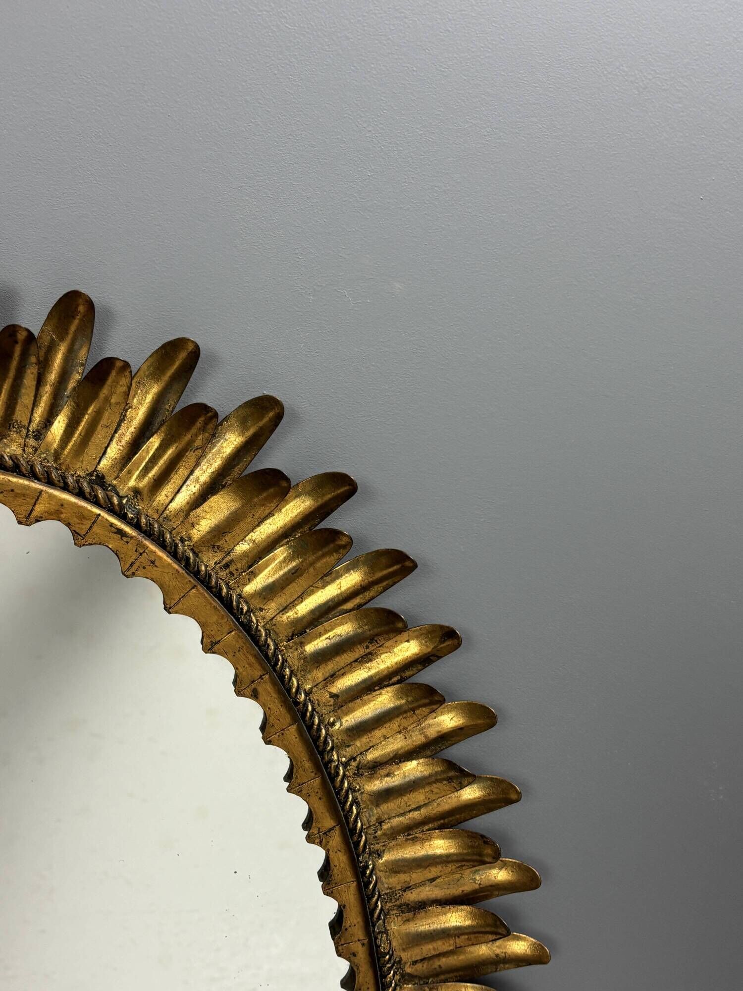 Midcentury bohemian Hollywood Regency Spanish gilt metal sun mirror, 1960s