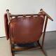 Fauteuil Amiral d'Eric Merthen, en cuir et palissandre