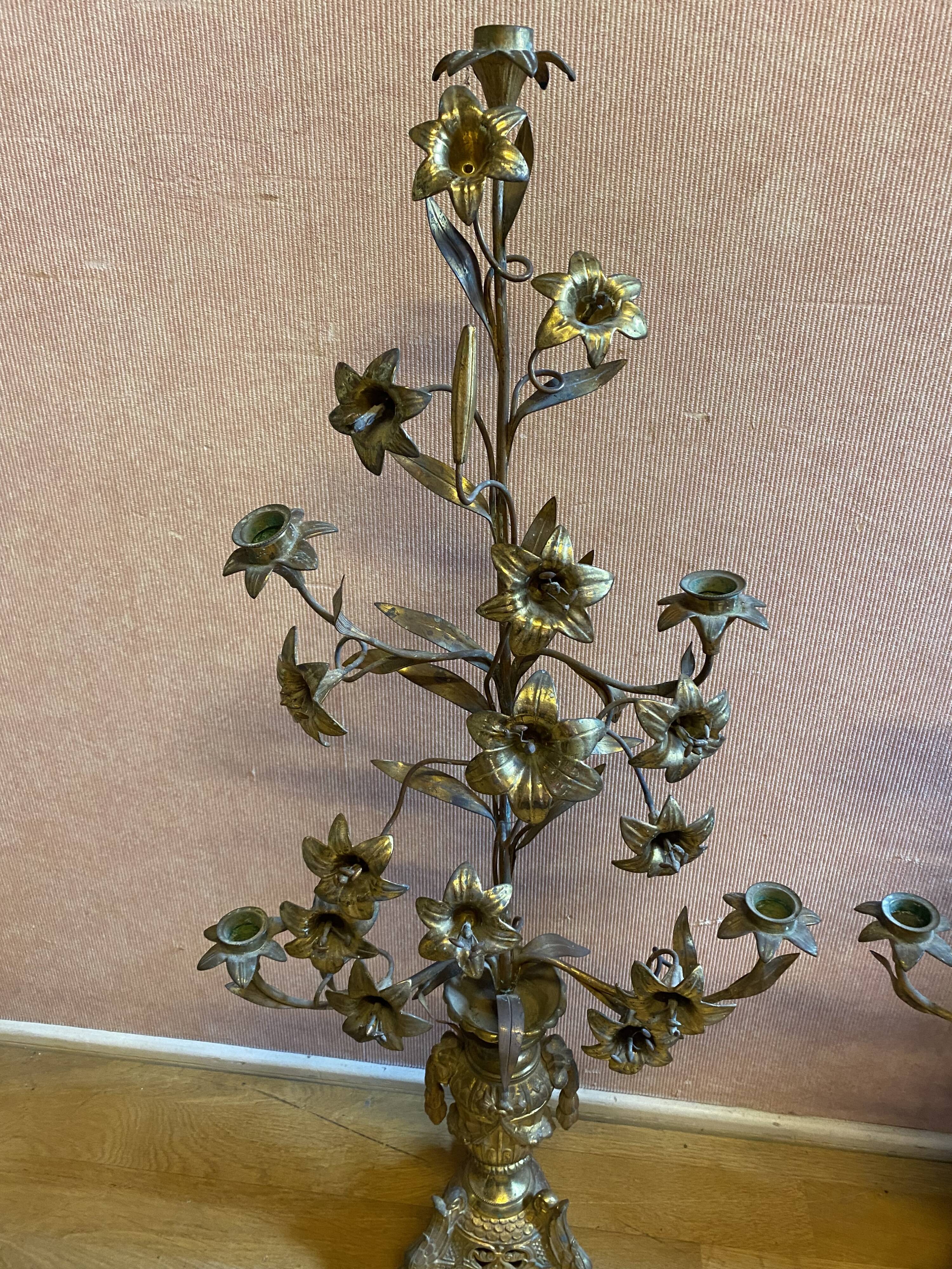 Pair of gilded bronze church candelabras.