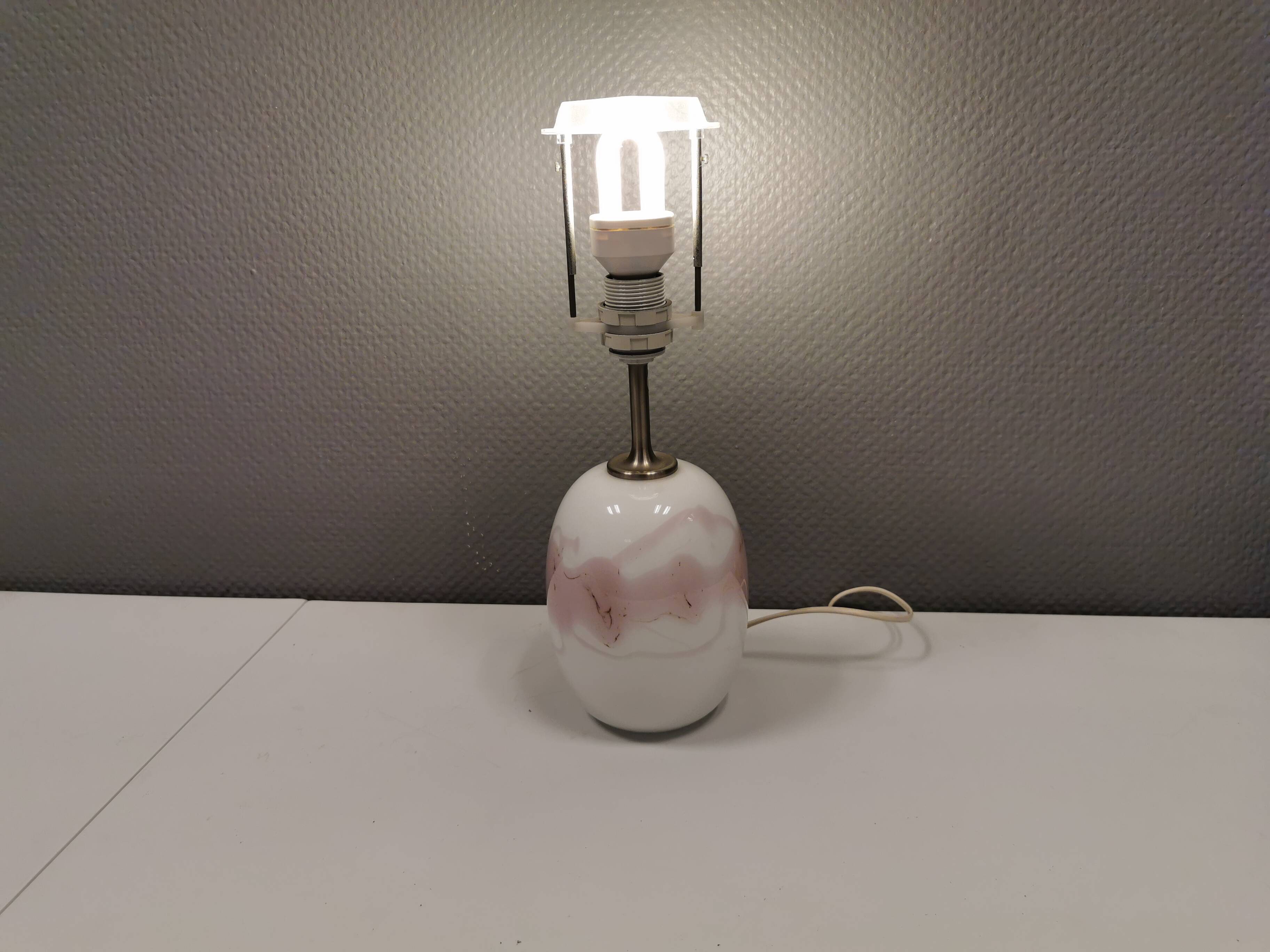 Table lamp in white and rose coloured glass designed by Michael Bang and manufactured by Holmegaard.