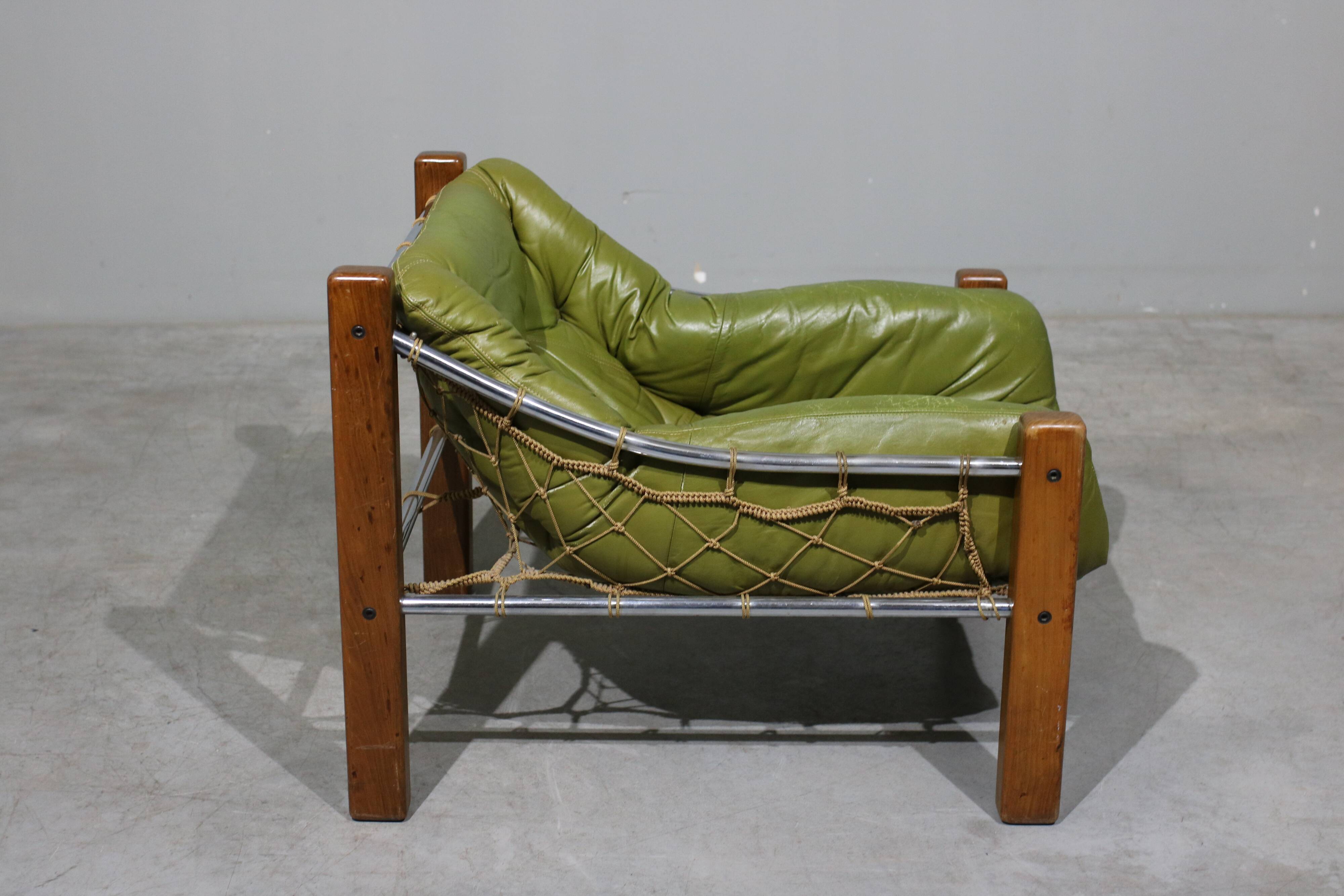 Leather Armchair and Ottoman by Jean Gillon