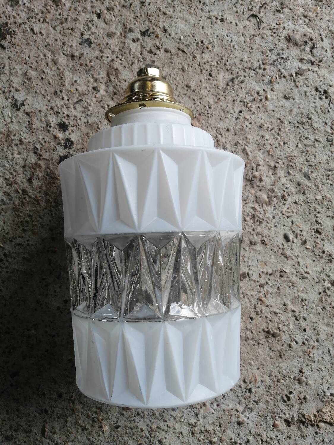 Vintage globe pendant light in molded glass.