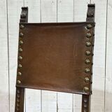 High-backed chair from the early 20th century in oak and leather