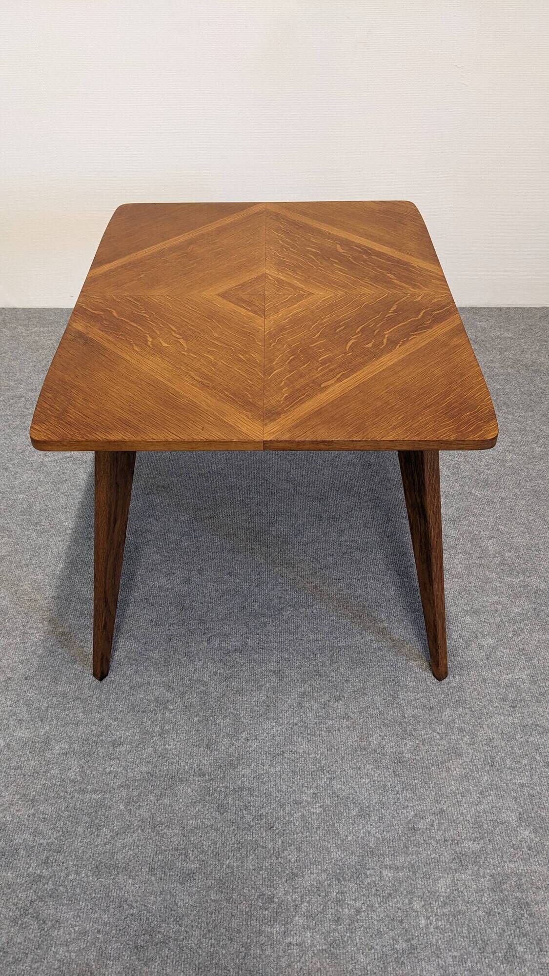 Modernist coffee or side table in oak marquetry, France 1960.