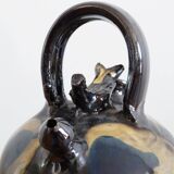 Glazed terracotta gargoulette with bird decoration