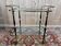 Glass, brass, and wood side table from the 1950s/60s.