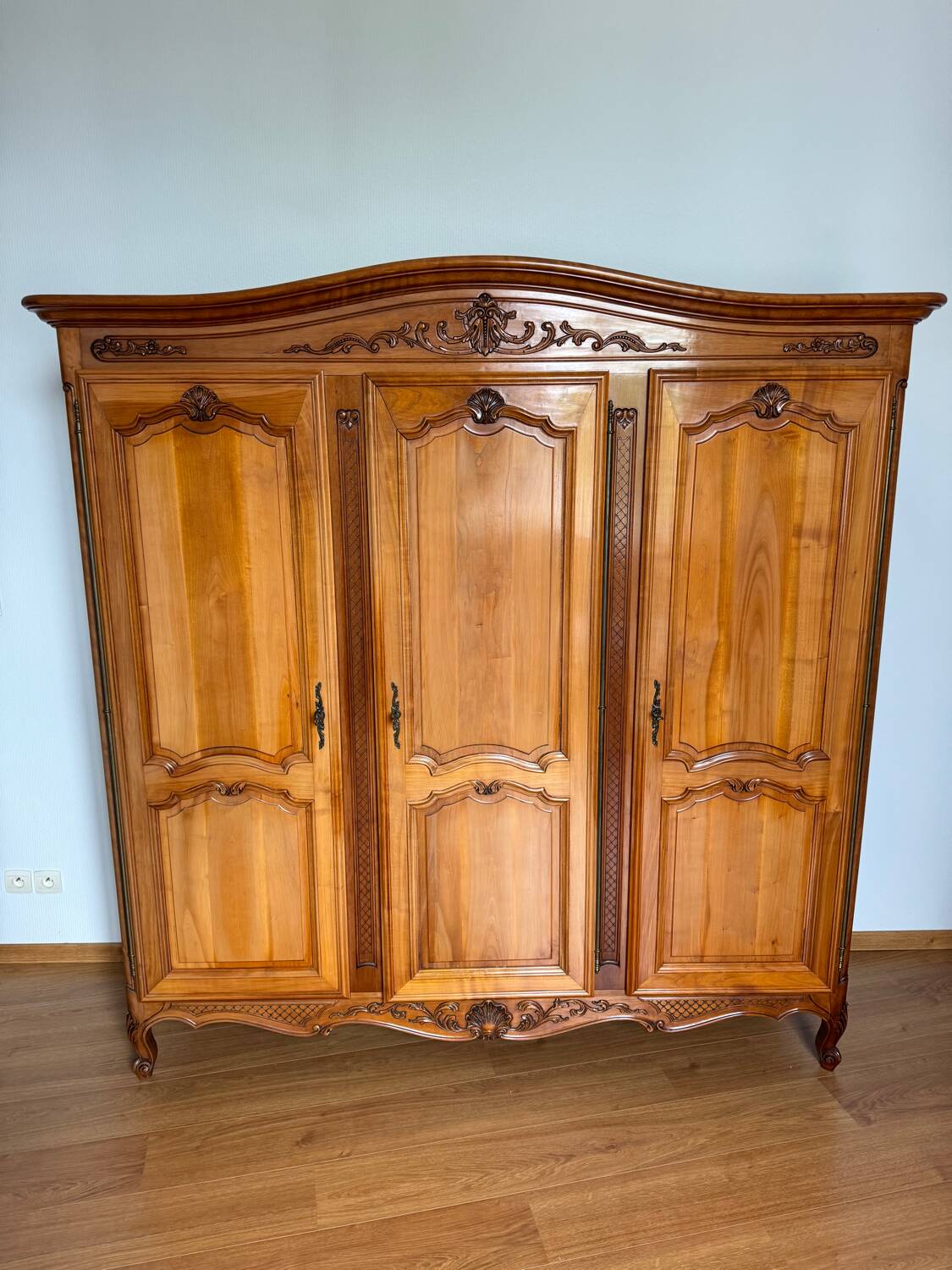 Three-door wardrobe in Regency style