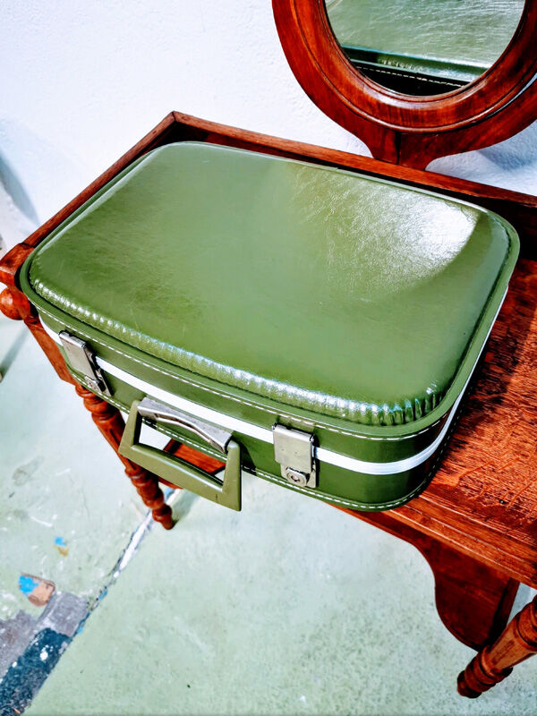 Green air hostess suitcase
