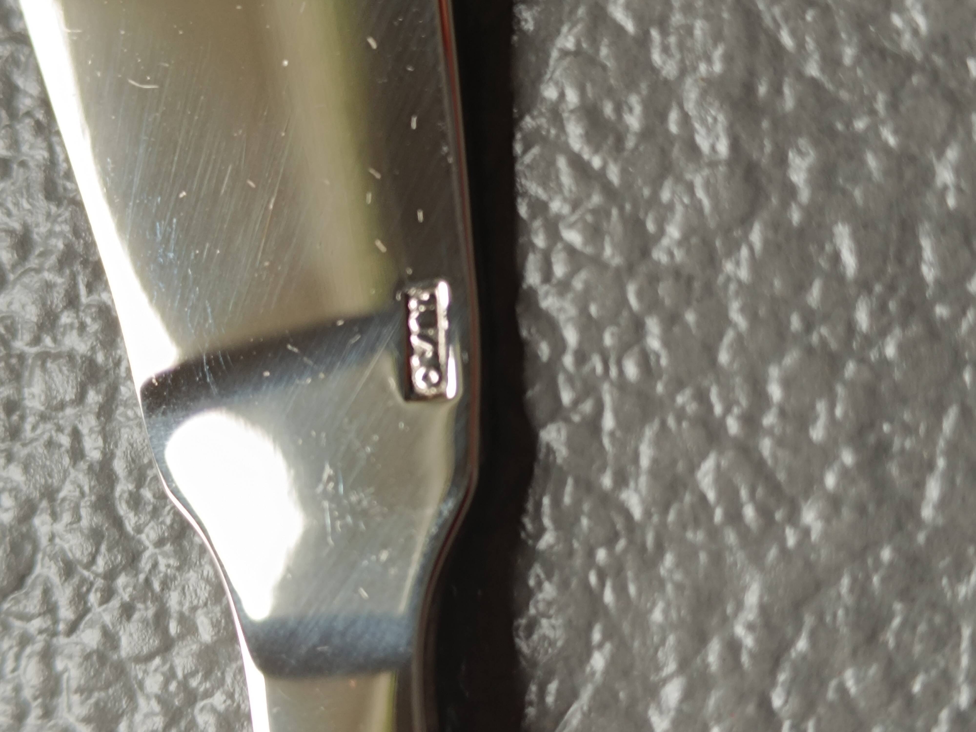 Cutlery Chabanna. Stainless steel and iridescent handle; 24 dessert place settings.