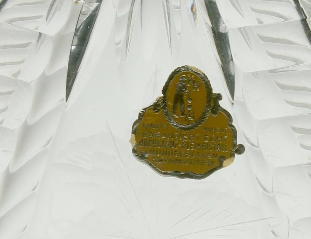 Matching pair of bohemian crystal decanters with art deco motifs