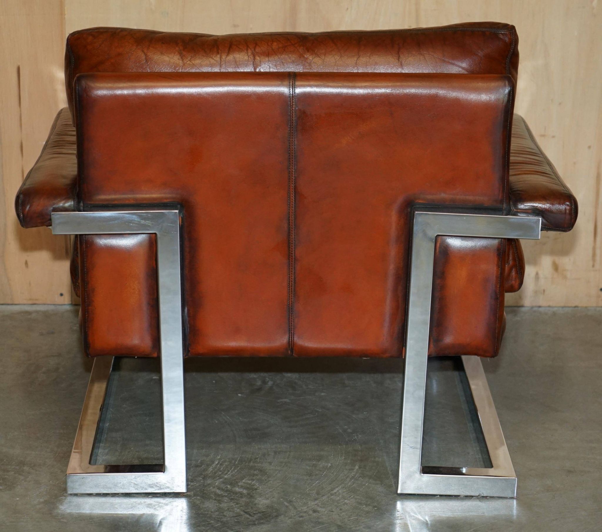 Restored suite Tim Bates for Pieff Mandarin leather chrome hardwood.