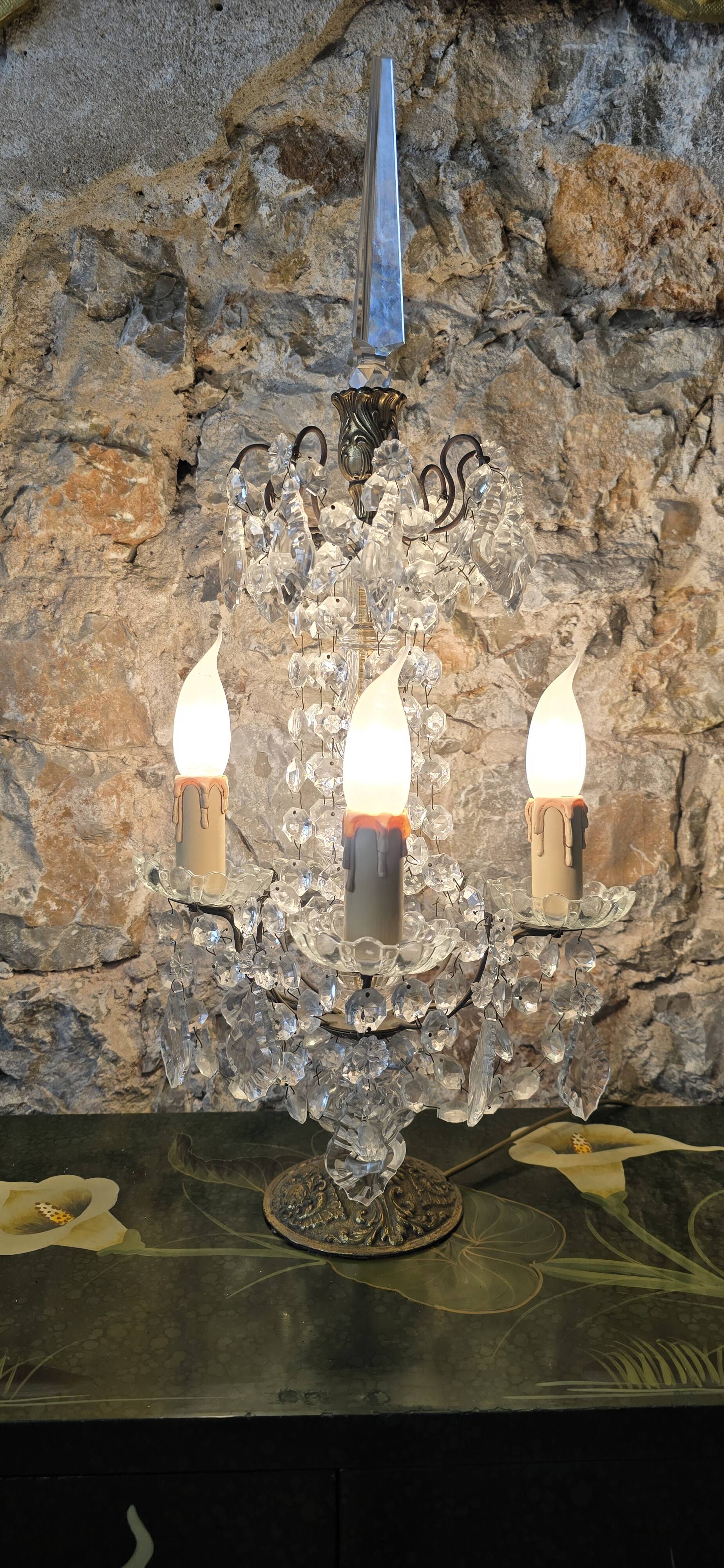 Girandole in gilded bronze and glass pendants