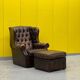 Brown leather chesterfield wing chair with Ottoman