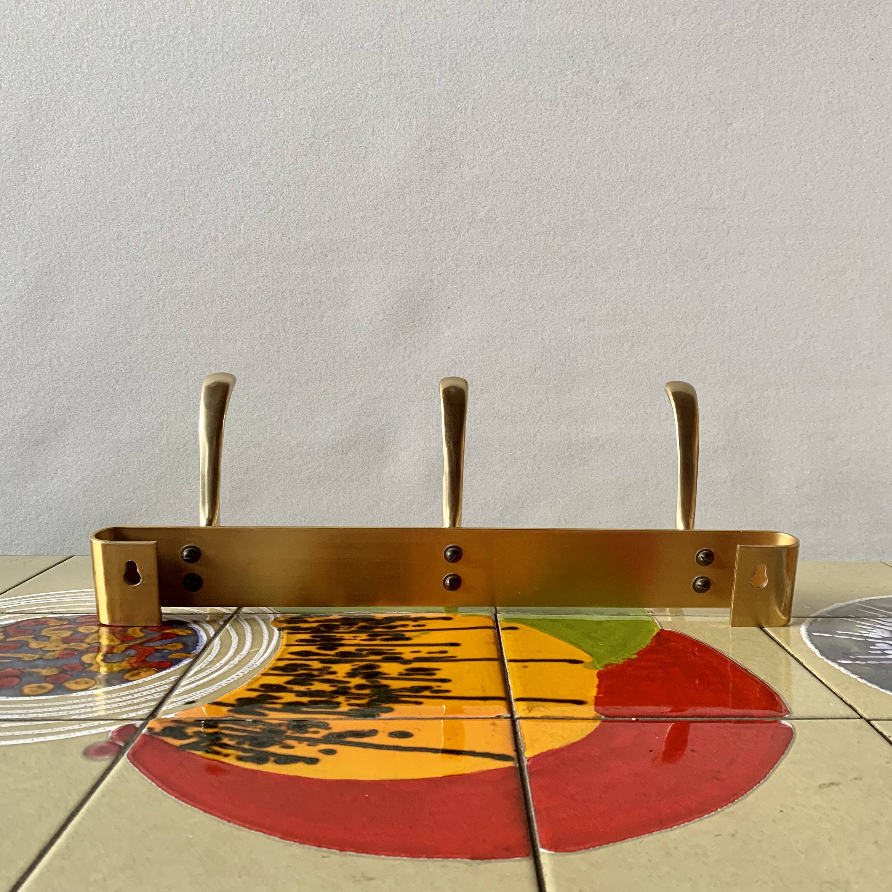 Vintage wall-mounted coat rack in golden aluminum - triple coat hook