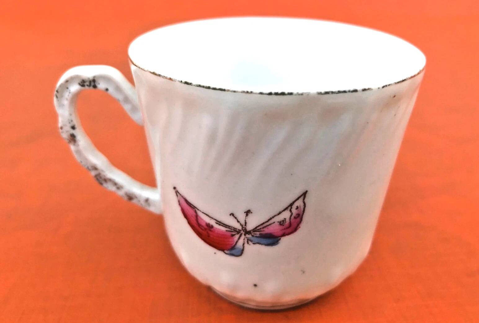 Old coffee cup / saucer in porcelain