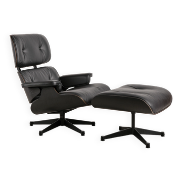 Lounge Chair and ottoman in black leather by Charles & Ray Eames, Vitra