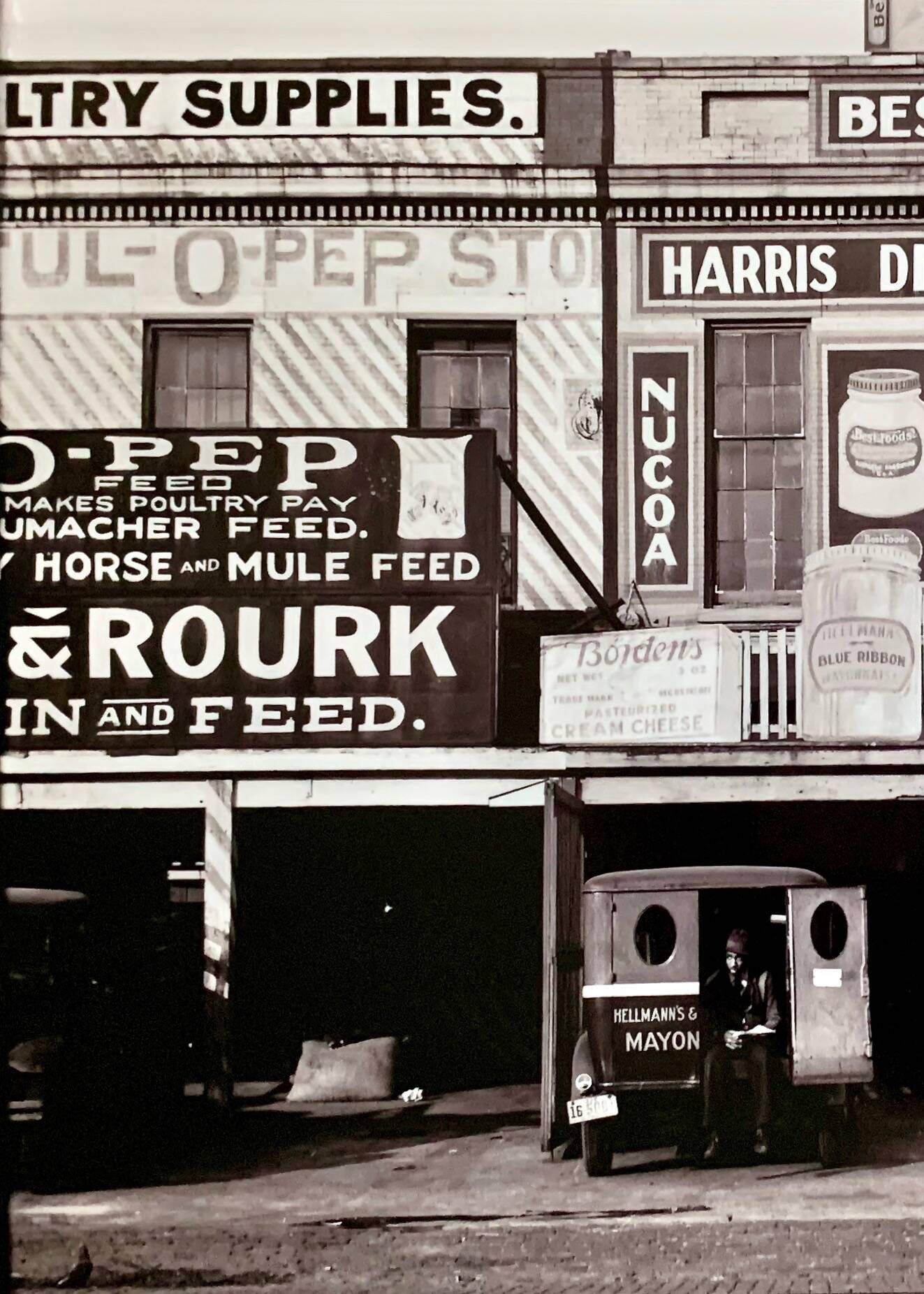 Walker Evans “Waterfront Advertising Warehouses, Louisiana (1938)”