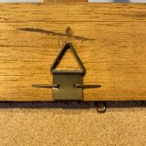 Beveled mirror in its wooden frame