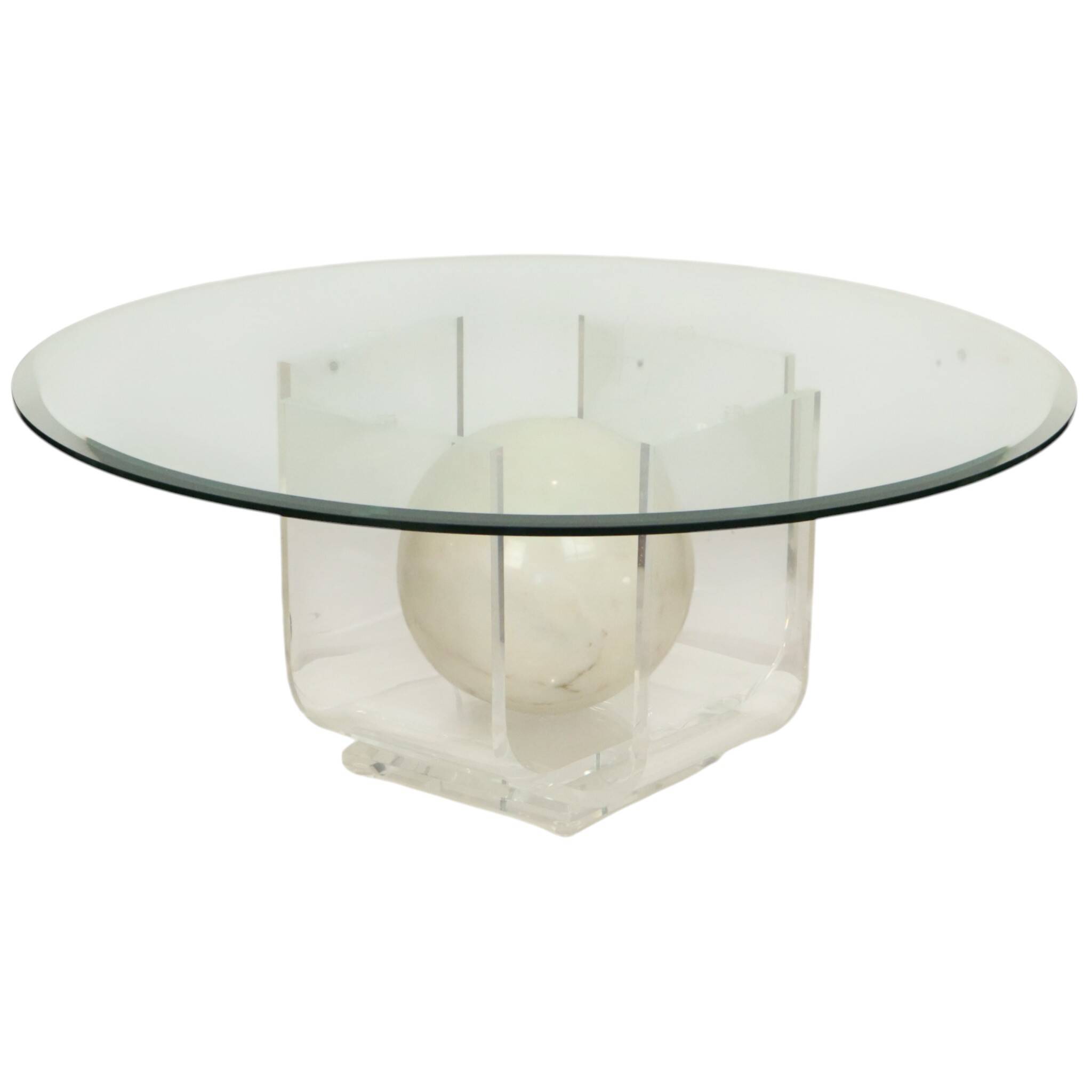 Vintage round coffee table in lucite and marbled glass.