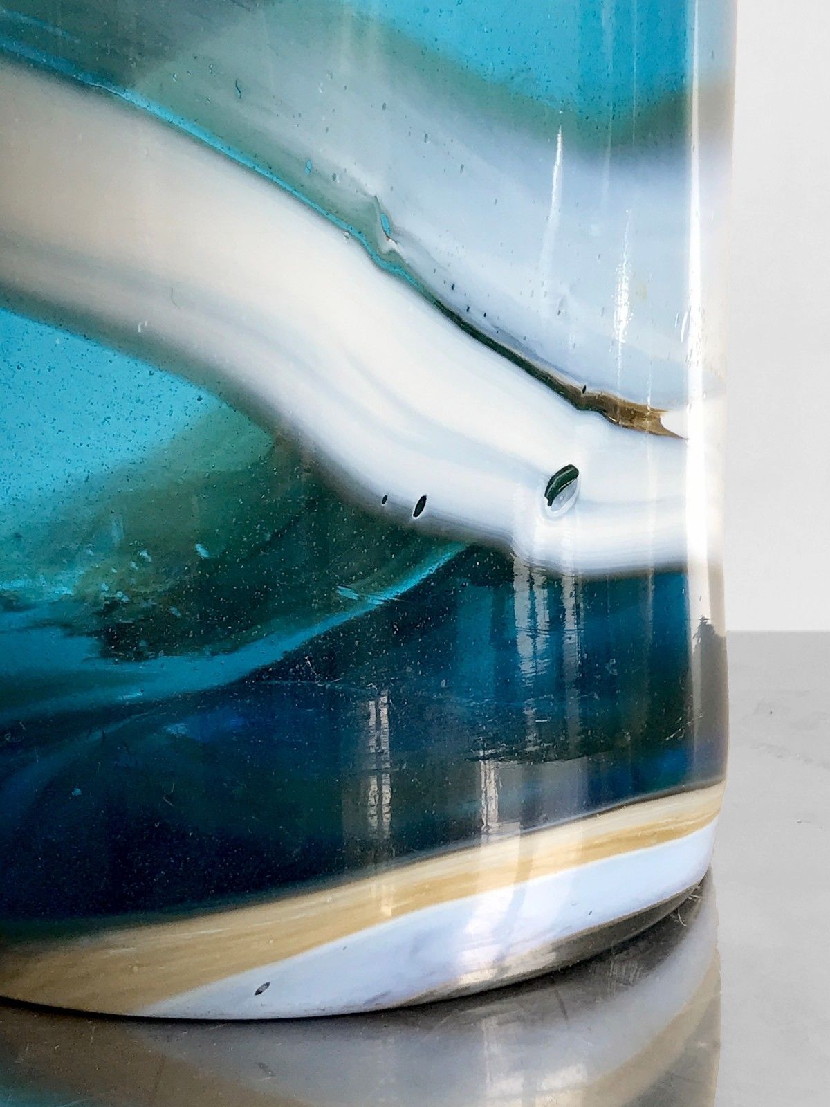 Cylindrical blue blown glass vase
