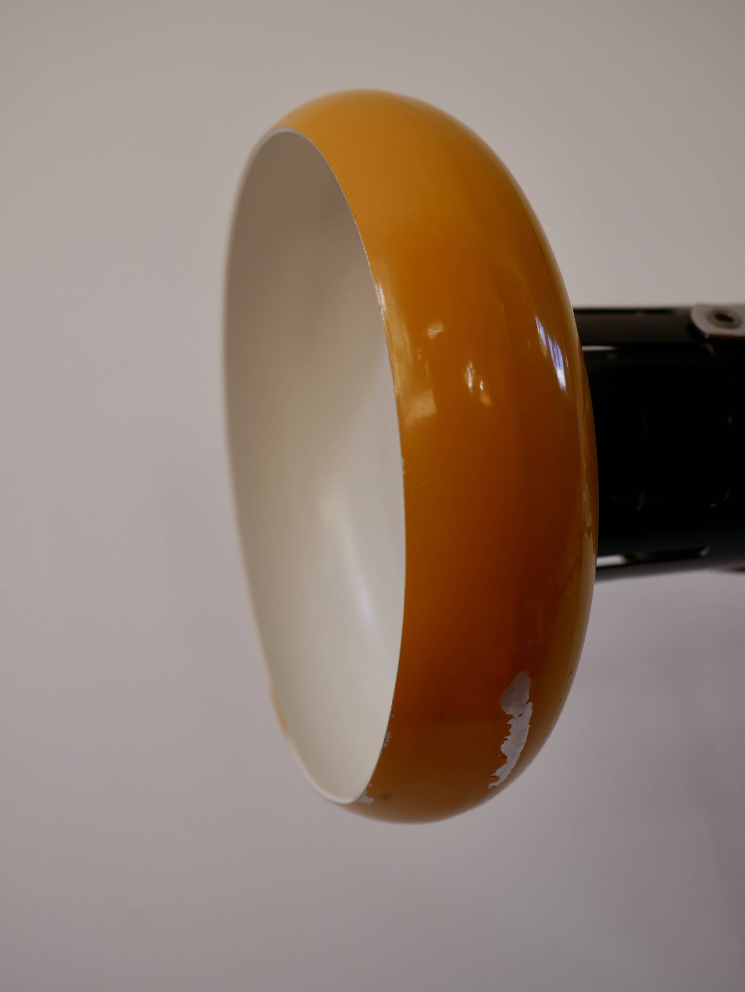 Articulated orange Aluminor desk lamp industrial design 70s