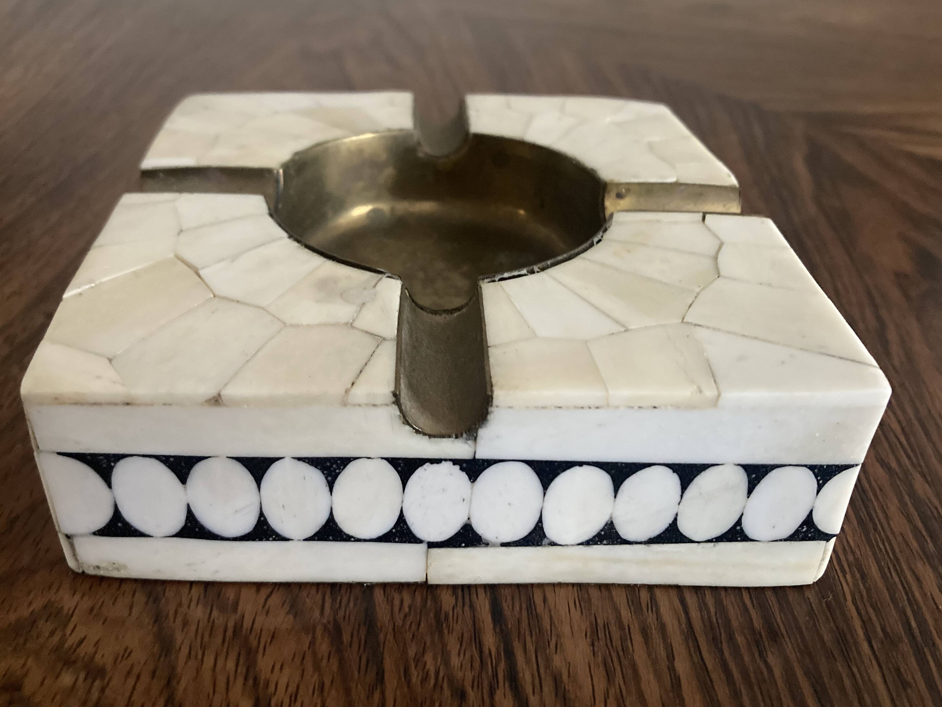 Bone and brass ashtray