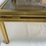 Table basse en verre et laiton