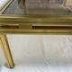 Glass and brass coffee table