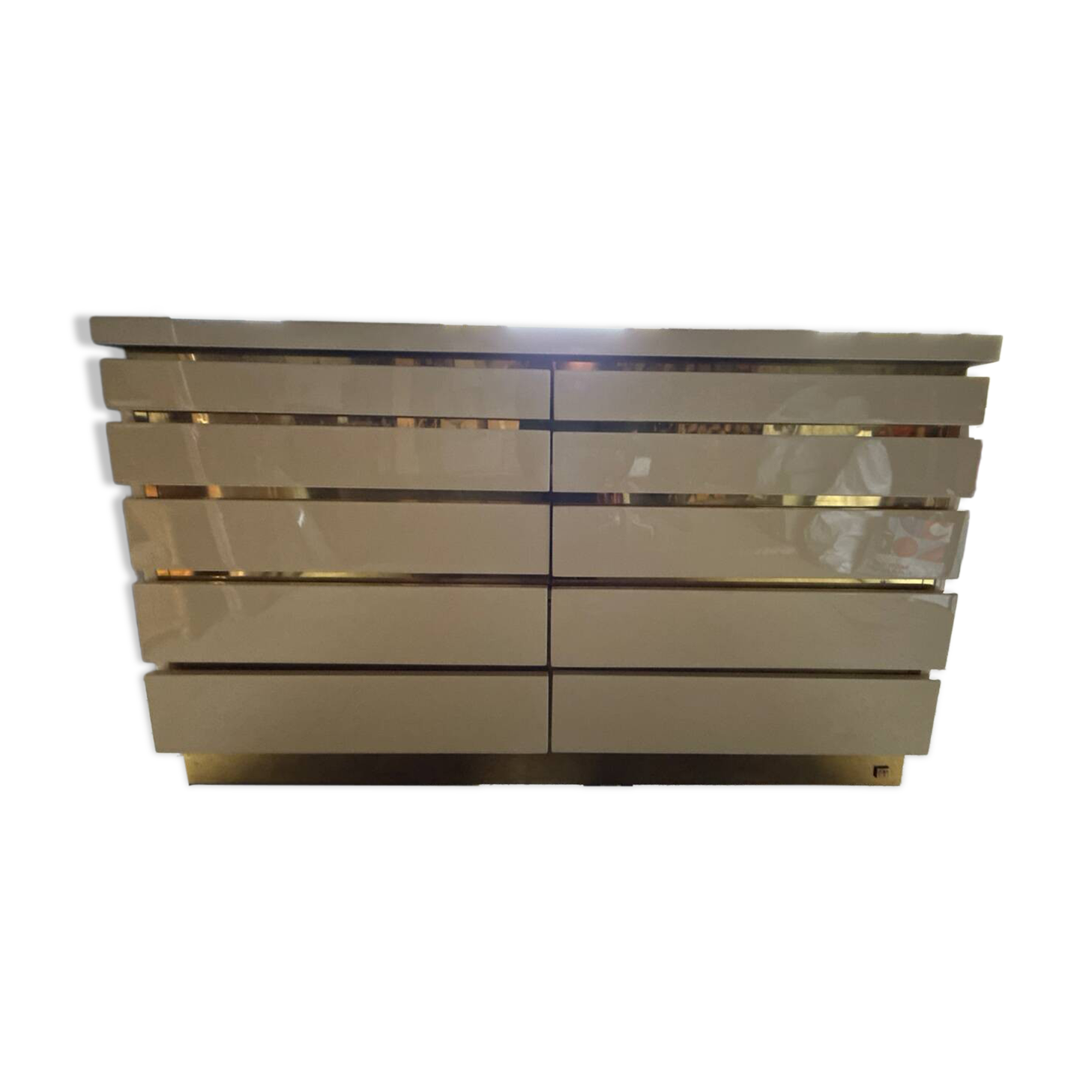 Chest of drawers signed Jean Claude Mahey in ivory lacquer and brass – 1920s