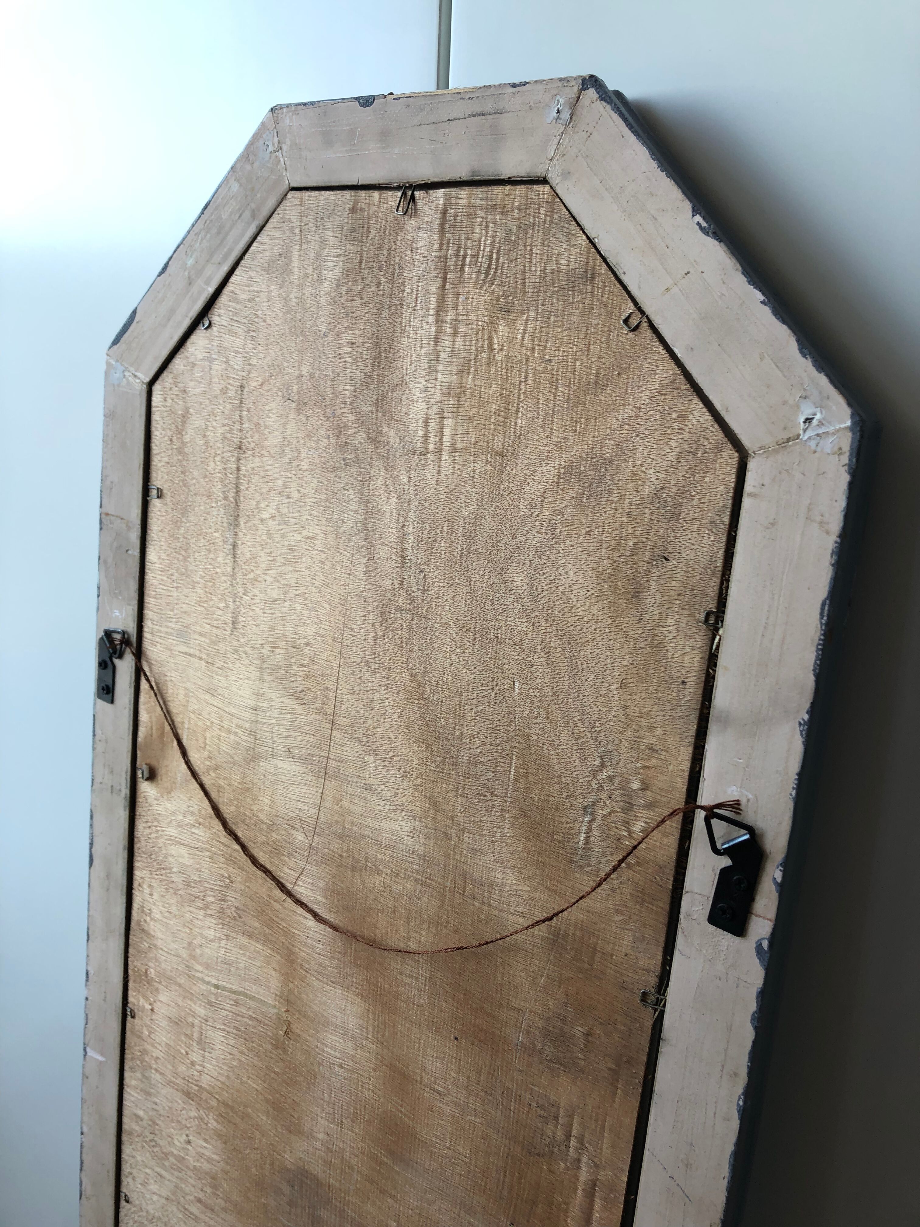 Old patinated mirror golden gray