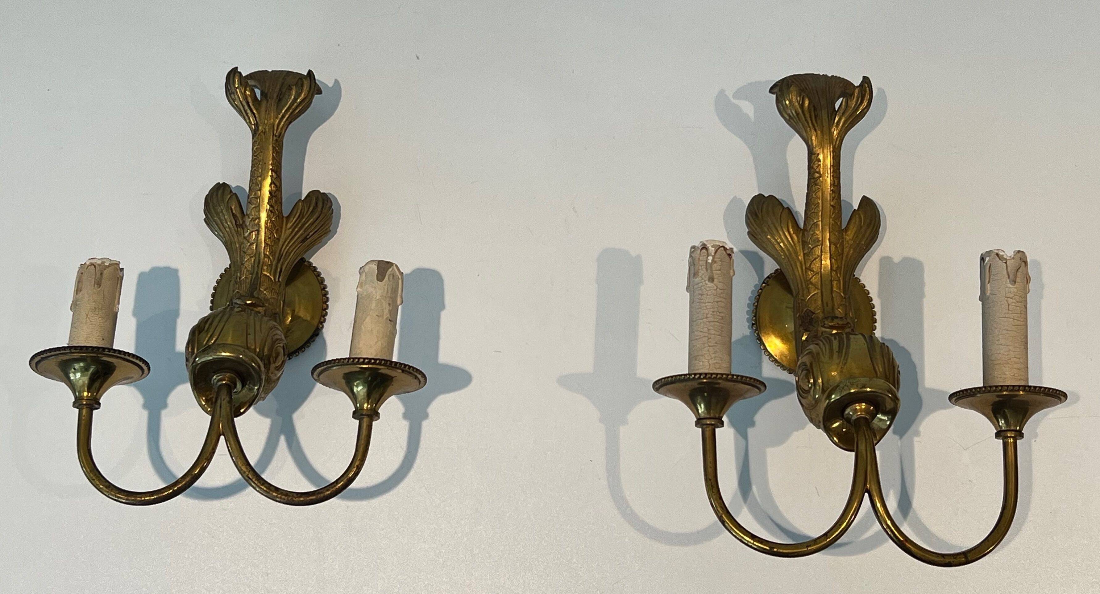 Pair of bronze wall sconces with dolphins by Maison Jansen