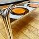 Table basse vintage en verre fumée et céramique