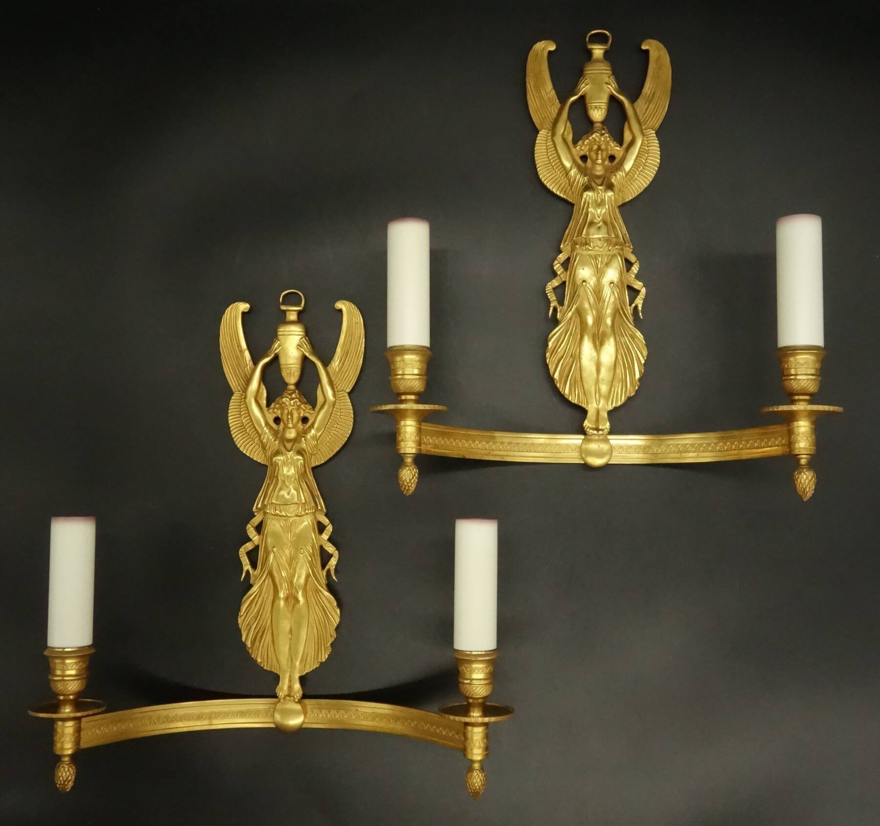 Large pair of Empire style winged caryatid sconces - gilded bronze
