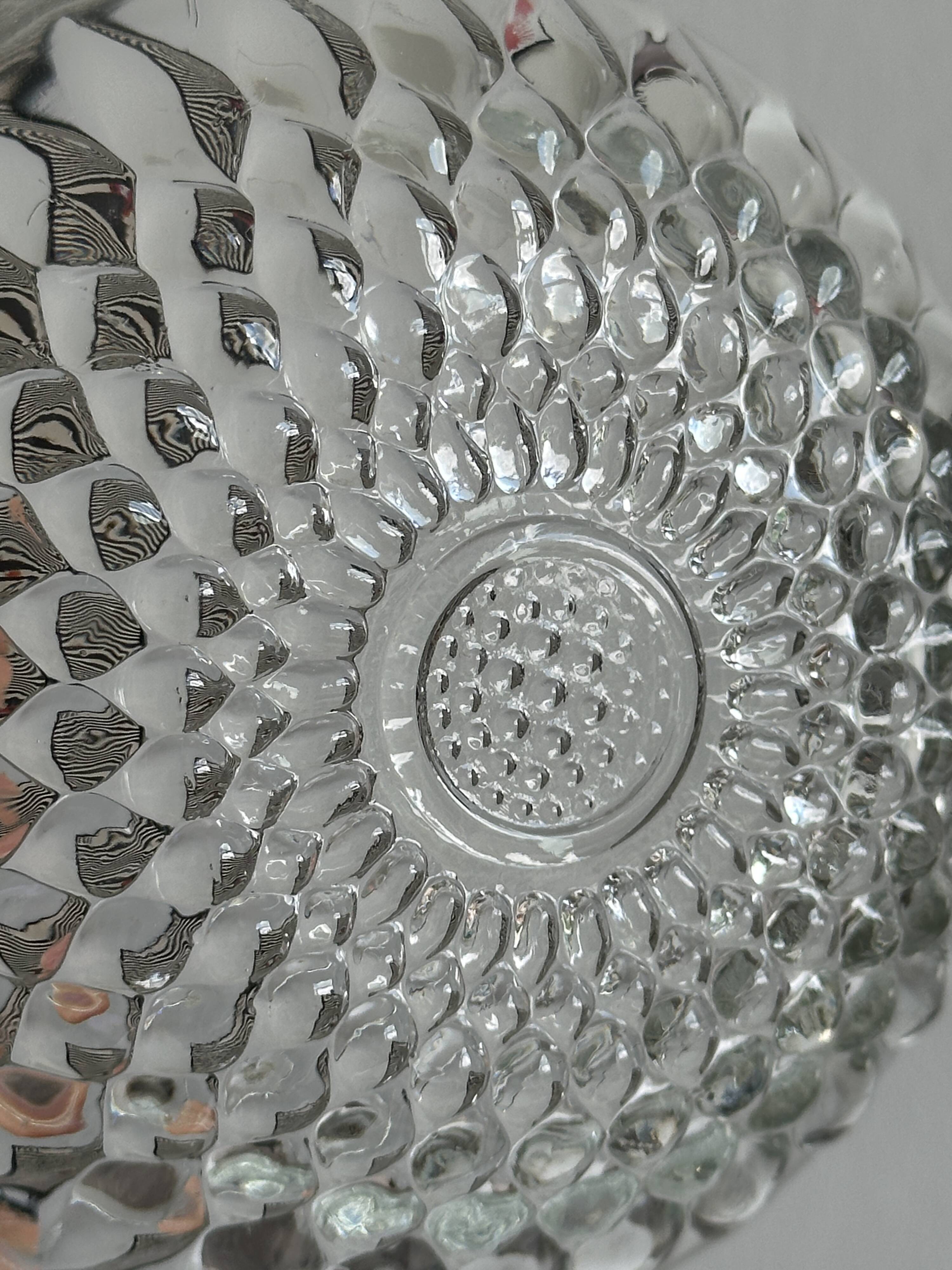 Glass sugar bowl with floral decoration lid