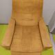 Old velvet heating chair on metal legs