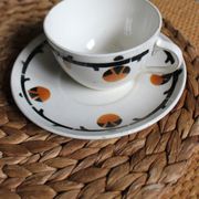 A large cup of chocolate tea, saucer Badonviller Barcarolle orange black.