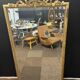 Grand miroir encadrement doré
