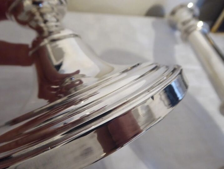 Pair of silver metal candle holders