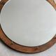 Vintage round wooden wall mirror with hooks