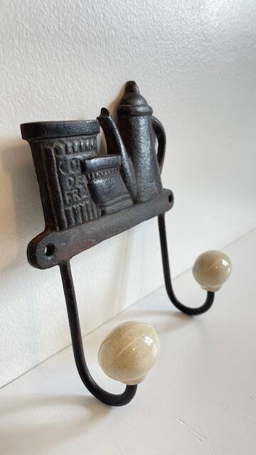 Coat rack made of steel and porcelain