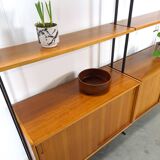 Modulair Omnia wandsysteem, Hilker, teak en zwart staal met legplanken