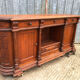 Antique sideboard with rounded edges in pitch pine from the late 19th century.